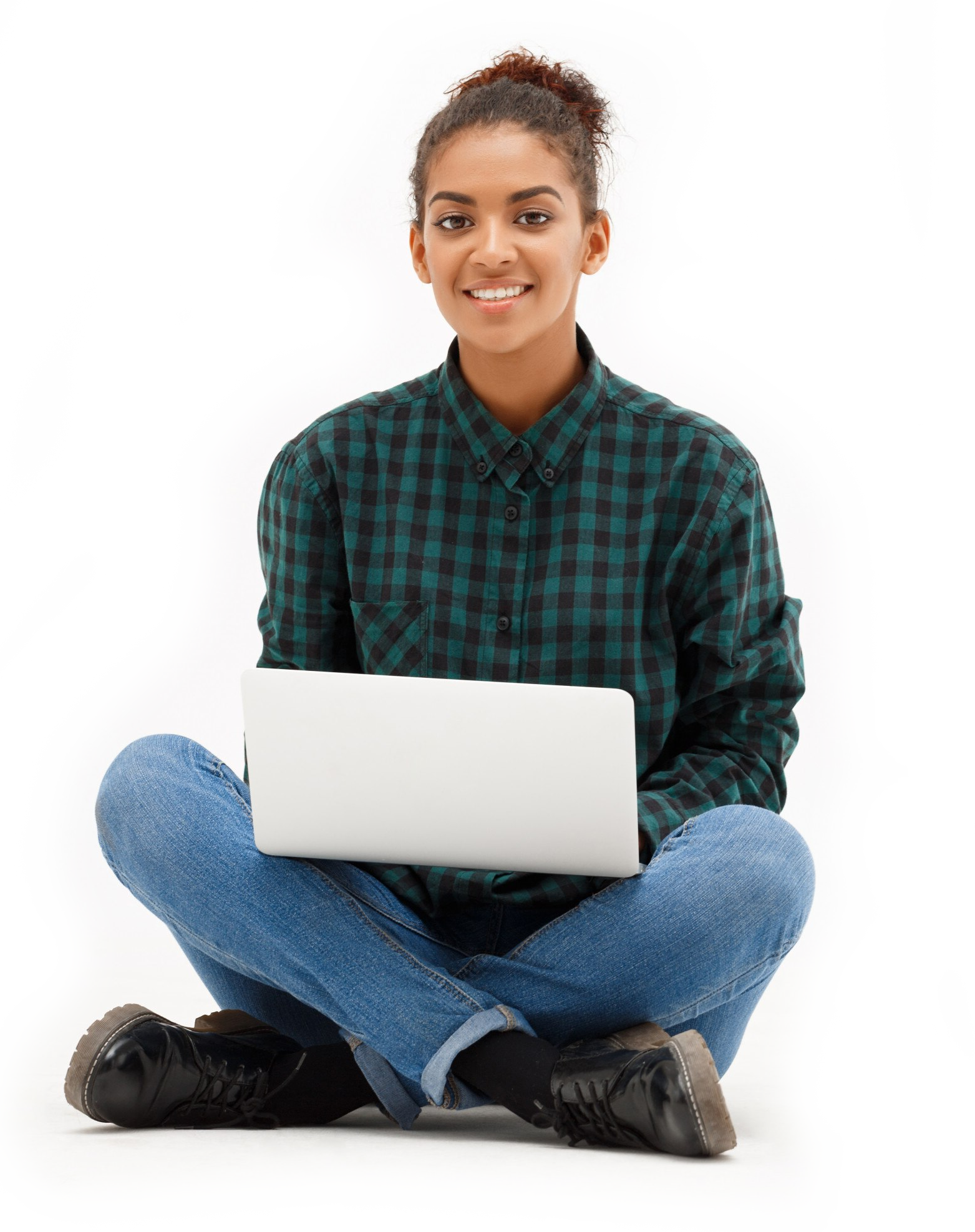 woman sitting cross legged working on her computer